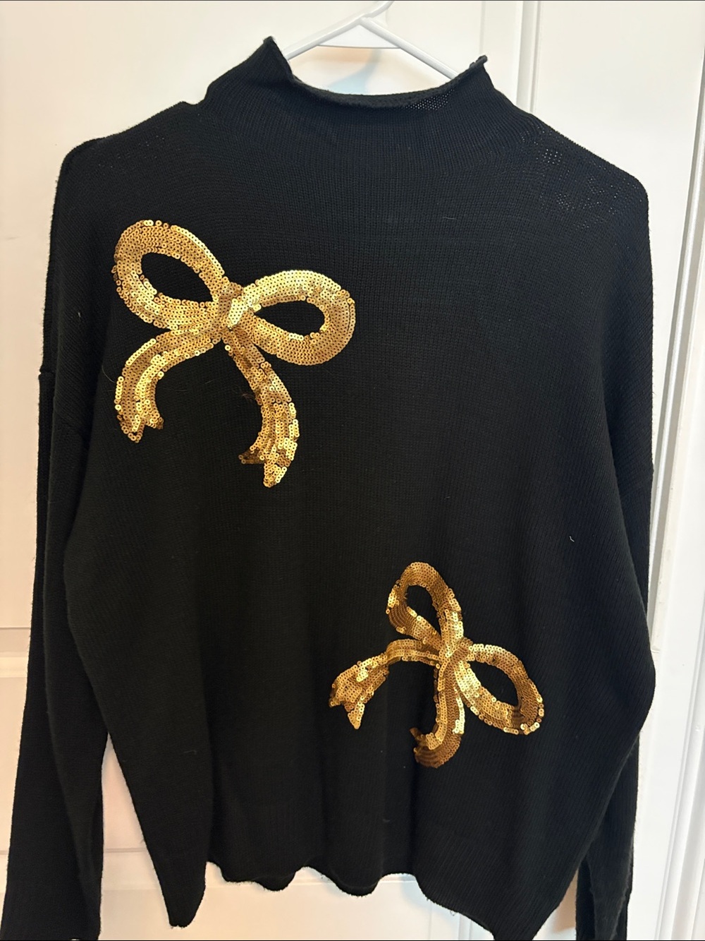 Cato Black Turtleneck Sweater with Gold Sequin Bows